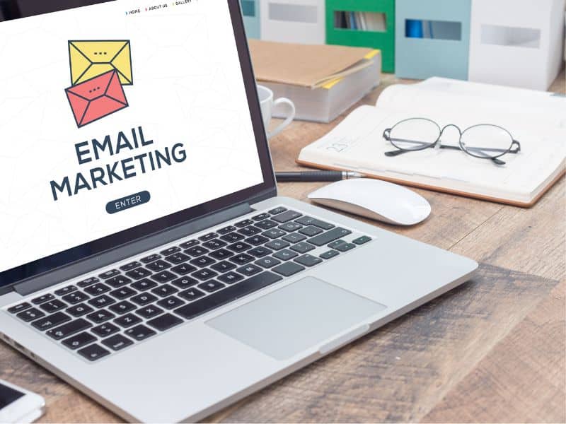 laptop with email marketing pulled up on the screen building an email list for digital products