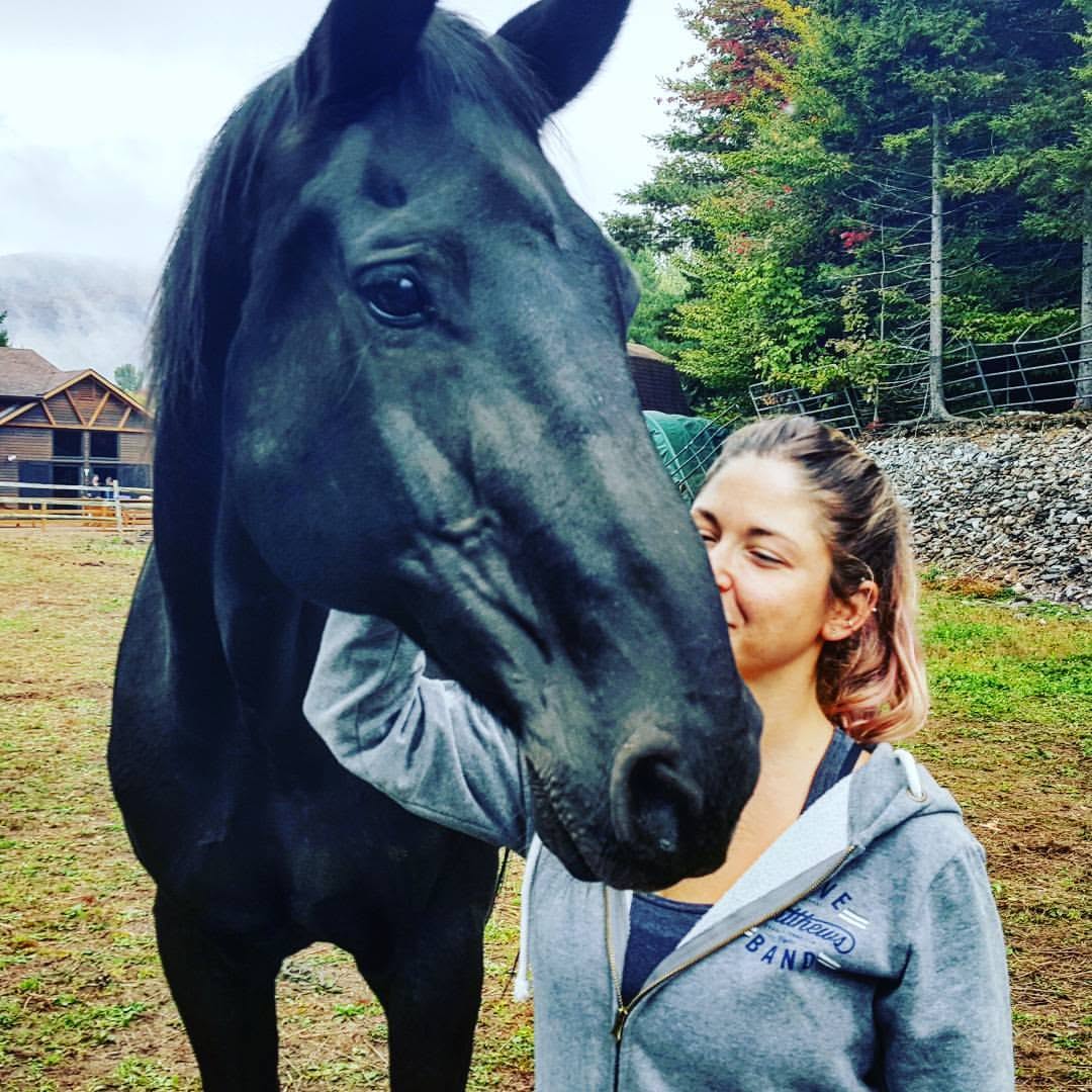 Jade selfie with black horse